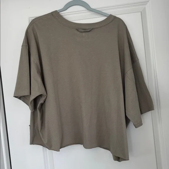 Free People Movement Fitness. Graphic Oversized T-Shirt in Olive and Yellow. - Picture 5 of 5